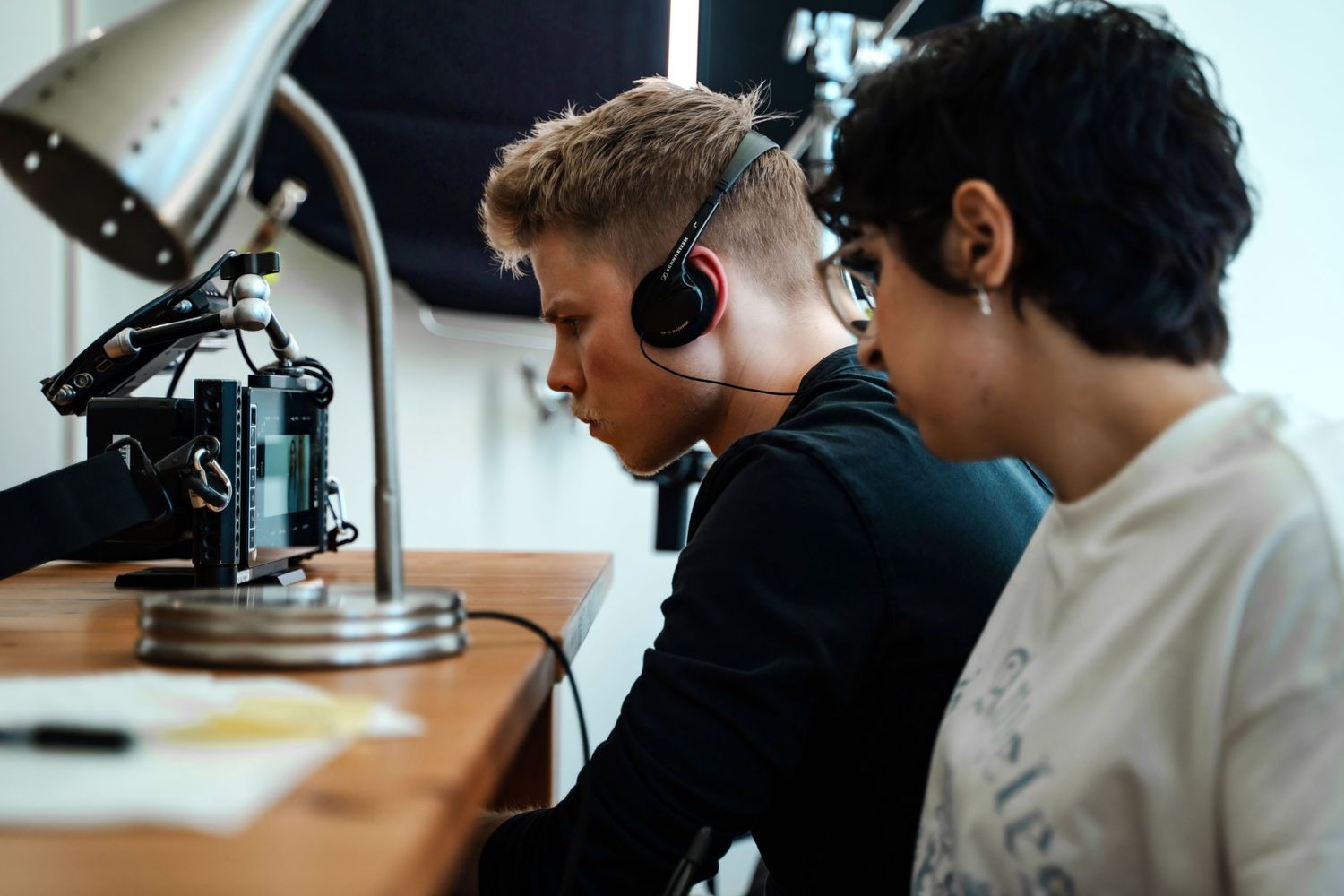 Dylan watching the monitor in headphones